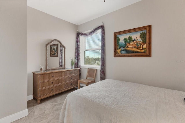 bedroom with light colored carpet