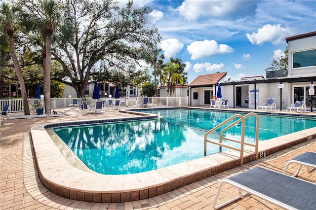 view of pool featuring a patio