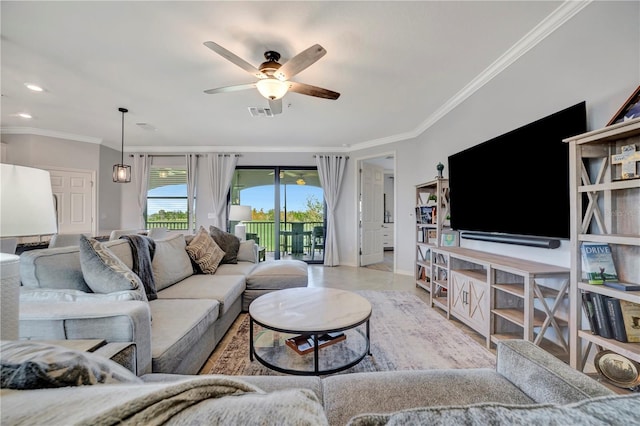 living room featuring light tile patterned floors, crown molding, and ceiling fan