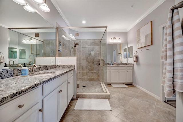 bathroom with vanity, tile patterned flooring, ornamental molding, and walk in shower