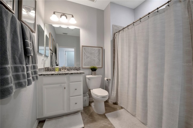 bathroom with vanity, tile patterned flooring, toilet, and a shower with shower curtain