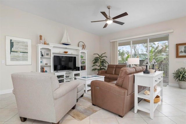 living room featuring ceiling fan and light tile patterned floors