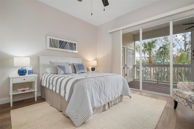 bedroom featuring access to outside, ceiling fan, and light hardwood / wood-style flooring