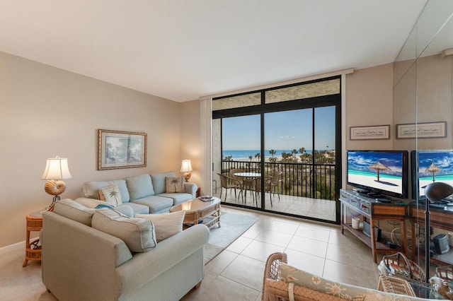 tiled living room featuring expansive windows