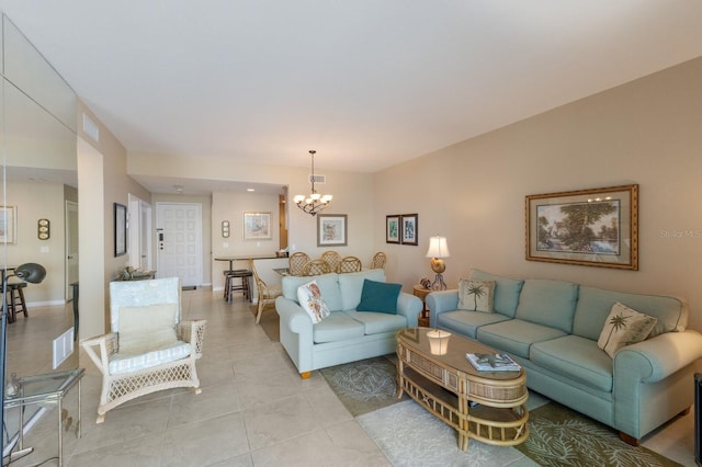 tiled living room with a chandelier