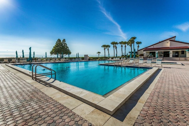 view of pool with a patio