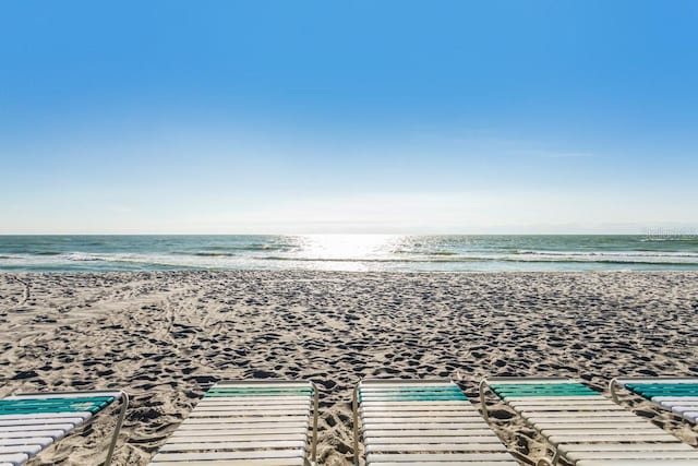 drone / aerial view with a view of the beach and a water view