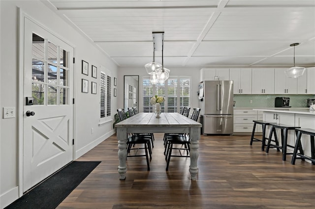 dining space featuring dark hardwood / wood-style flooring