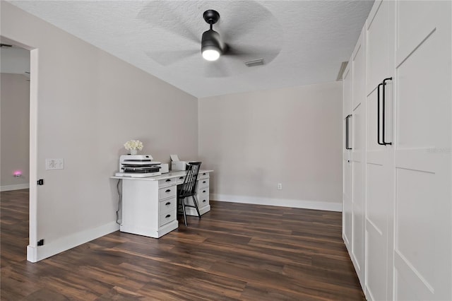 office featuring ceiling fan, a textured ceiling, and dark hardwood / wood-style floors