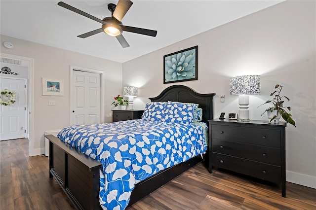 bedroom featuring a closet, ceiling fan, and dark wood-type flooring