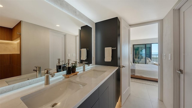 bathroom with vanity and tile patterned flooring