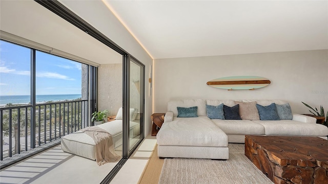 living room featuring a water view