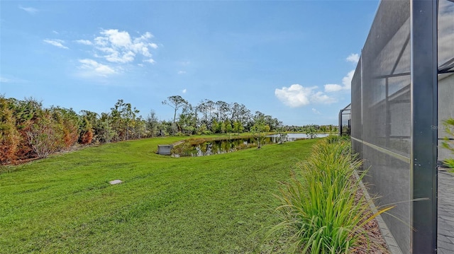 view of yard with a water view