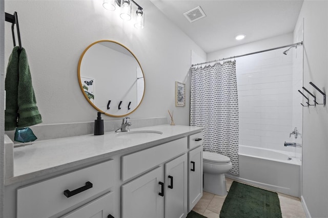 full bathroom featuring toilet, vanity, shower / bath combo, and tile patterned flooring