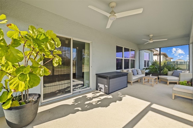 view of patio / terrace with ceiling fan and an outdoor hangout area