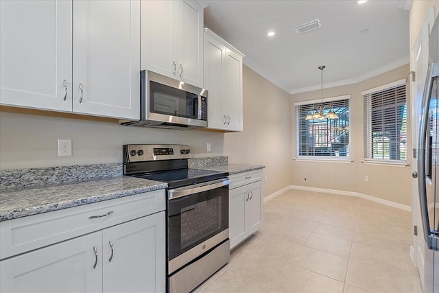 kitchen featuring appliances with stainless steel finishes, white cabinets, light tile patterned floors, crown molding, and light stone countertops