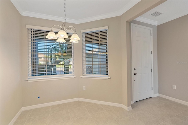 unfurnished dining area with crown molding, a notable chandelier, and tile patterned floors