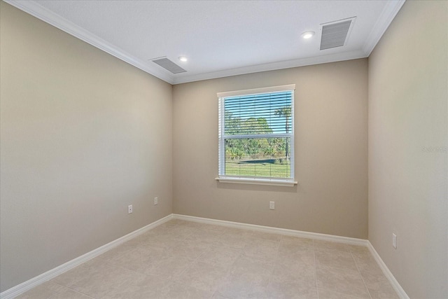 unfurnished room with ornamental molding