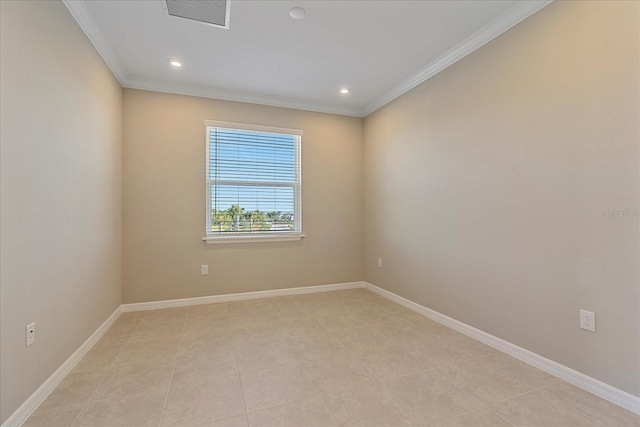 tiled empty room with crown molding