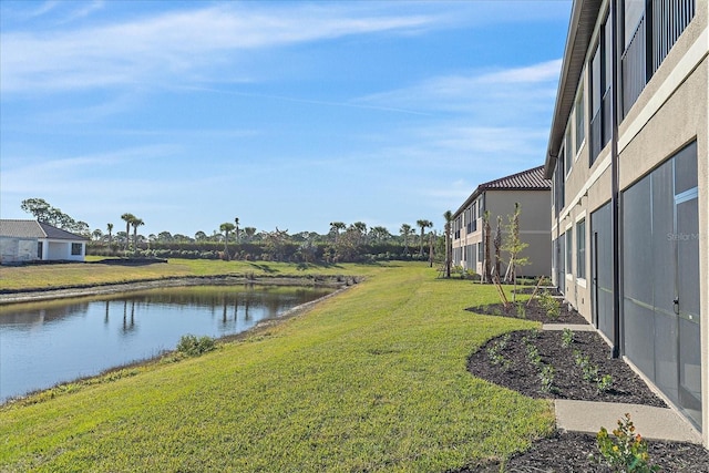 view of yard with a water view