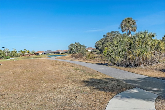 view of home's community featuring a yard