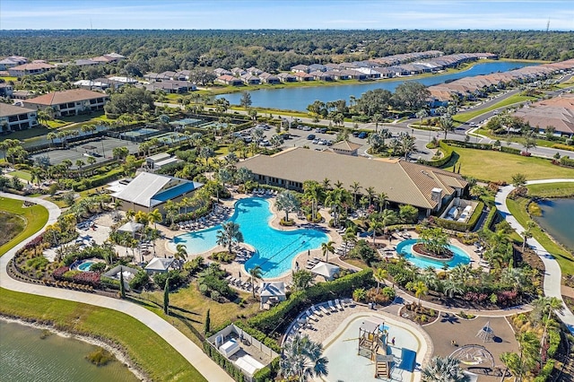 birds eye view of property featuring a water view