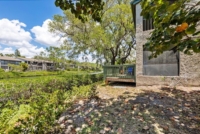 view of yard featuring a deck