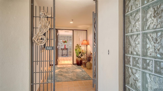 interior space with light tile patterned floors