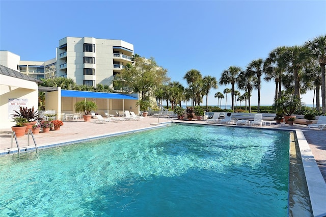 view of swimming pool featuring a patio area