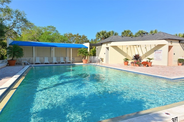 view of pool with a patio