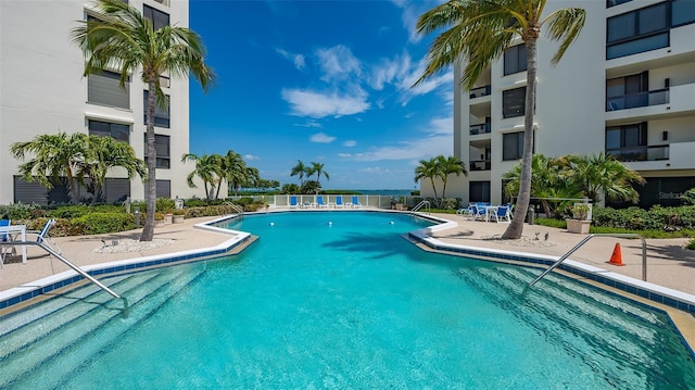 view of swimming pool featuring a patio area