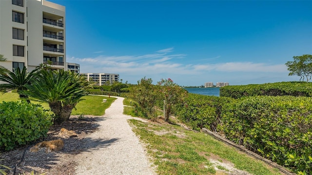 view of home's community with a water view