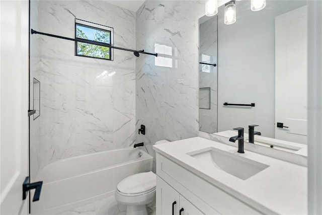 full bathroom featuring toilet, tiled shower / bath combo, and vanity