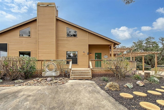 view of front of house featuring a pergola