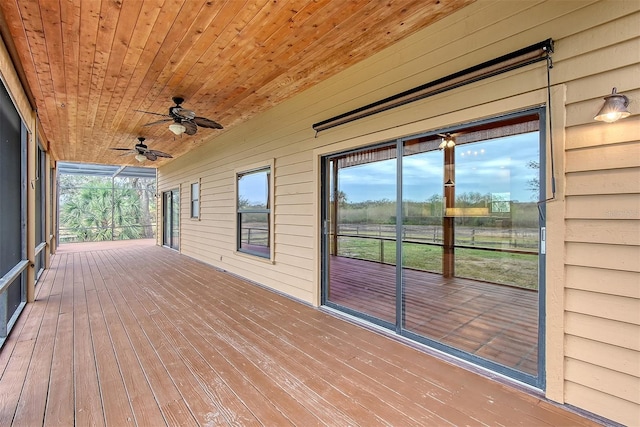 wooden deck with ceiling fan