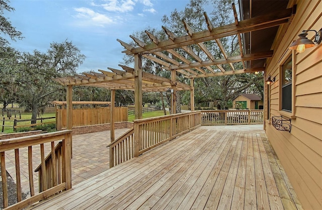 wooden terrace with a pergola