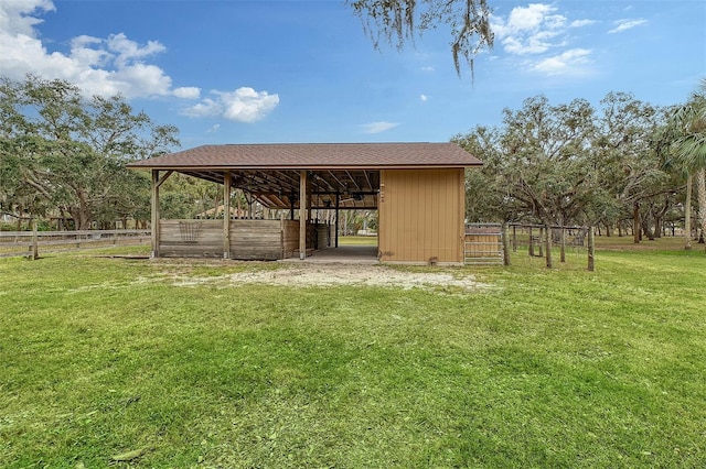 view of home's community featuring an outdoor structure