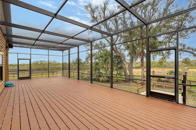 unfurnished sunroom featuring plenty of natural light