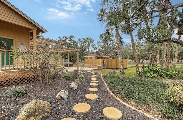 view of yard with a pergola