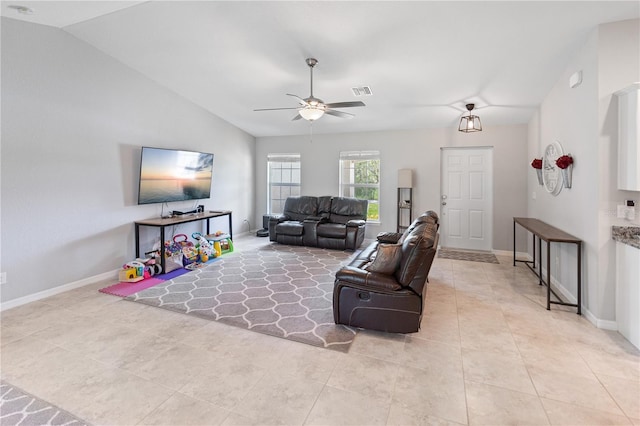 living room featuring vaulted ceiling and ceiling fan