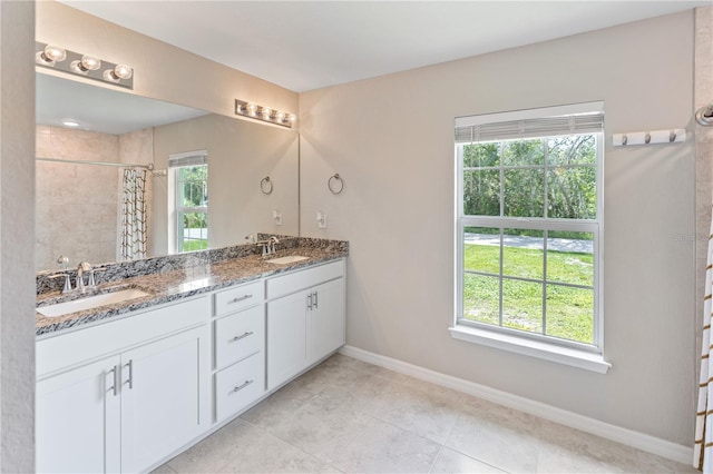 bathroom featuring vanity and walk in shower