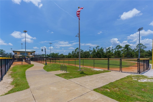 view of property's community with a lawn