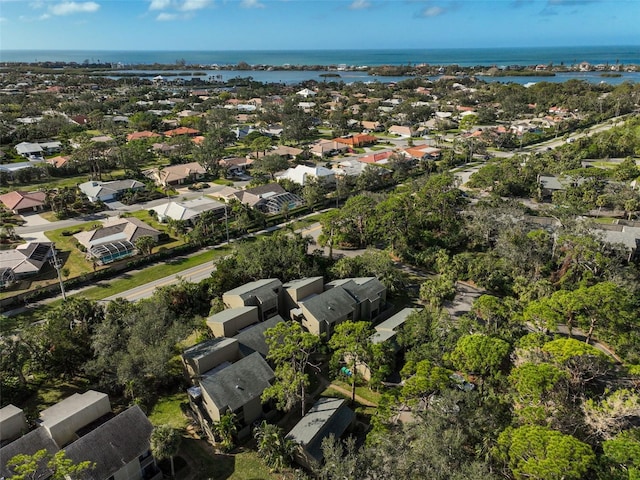 bird's eye view featuring a residential view and a water view