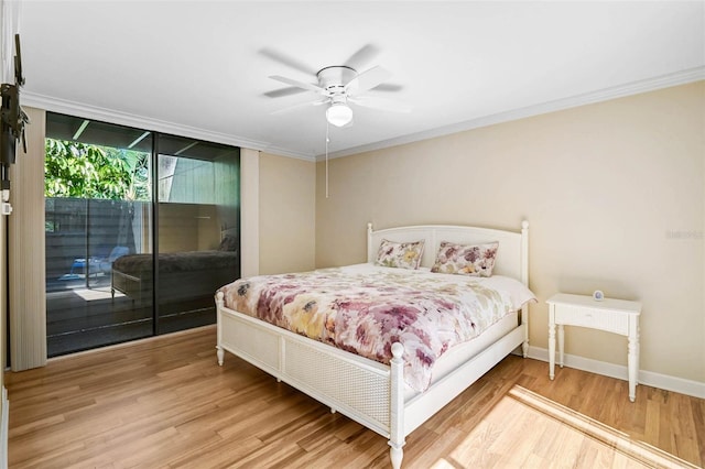 304 Pine Run Dr, Osprey, FL 34229 - bedroom with access to outside, light wood-style floors, crown molding, baseboards, and a ceiling fan