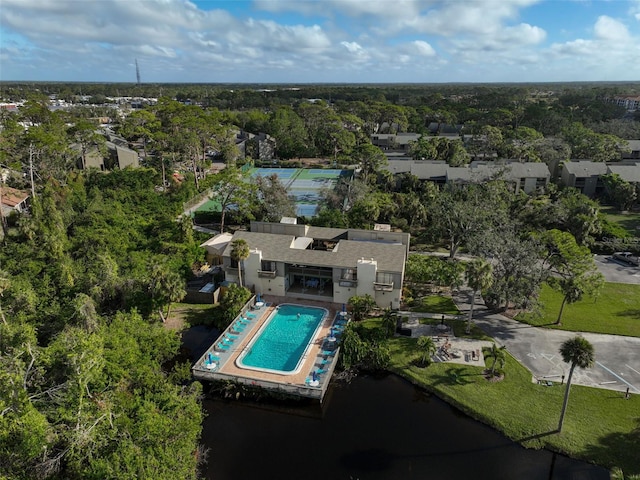 304 Pine Run Dr, Osprey, FL 34229 - aerial view of a pool area and a tree filled landscape