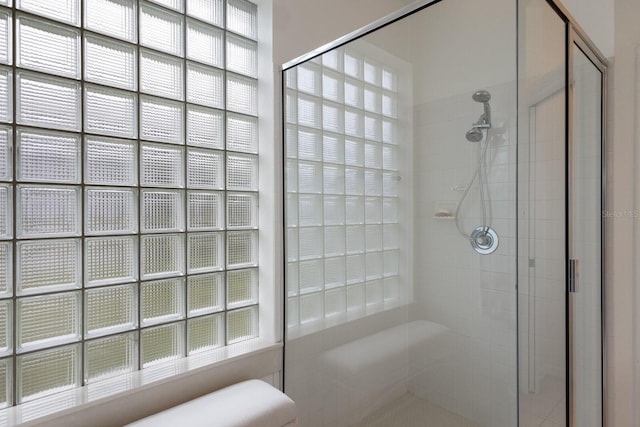 bathroom with an enclosed shower