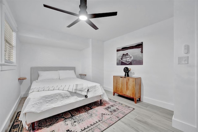 bedroom featuring ceiling fan and light wood-type flooring