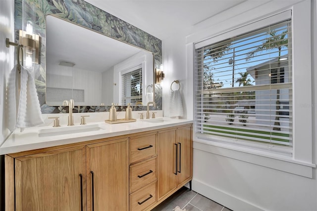 bathroom with vanity and tile patterned flooring