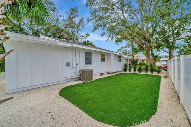 view of yard with central AC