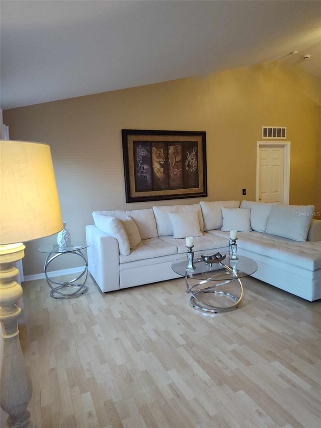 living room with light hardwood / wood-style floors